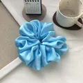 Oversized light blue pleated satin scrunchie for women with elegant silk texture - Light Blue