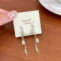Elegant cream tulip drop earrings with pale green leaf charms and delicate silver chain - Double Tulip (YJXW3)