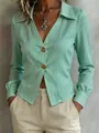Close-up of mint green V-neck long sleeve shirt with decorative buttons for office wear - Emerald