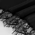 Close-up of black satin midi skirt with elegant eyelash lace trim detail and texture - S / Green