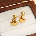 Orecchini a lobo a cuore in acciaio al titanio dorato con chiusura a vite sicura a sfera - Cuore 3D Oro Coppia