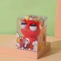 Giocattolo drago rosso con occhi che saltano fuori in scatola regalo trasparente - Scatola regalo / Rosso