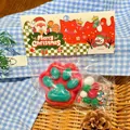 Giocattolo squishy zampa di gatto rosso e verde in confezione natalizia con pompon. - Stile Zampa di Gatto con Base Rossa Natalizia / 1 Pezzo Con Pacchetto Accessori Fai Da Te