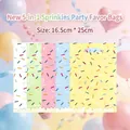 Detailed macro view of 5-in-1 colorful sprinkle pattern party gift bags 16.5x25cm - Graphic Print / 50 Pieces