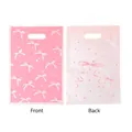Pink and white ribbon bow print pearlescent film gift bags for party gift packaging - Printed Style / 10 Pieces/Pack (16.5*25cm)