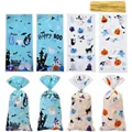 Halloween candy gift bags set with 4 ghost and pumpkin patterns and twist ties - Four-in-One Print / 100 Pieces/Pack (13*27.5cm)