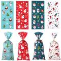 Christmas themed OPP packaging bags with Santa Claus and snowman prints for candy - Christmas 4-in-1 Style / 100pcs Pack