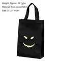 Bolsa de dulces de Halloween negra con cara de fantasma luminosa, tela no tejida - Estilo F
