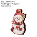 Wooden Christmas snowman desk ornament featuring a cartoon snowman with a candy cane - Snowman