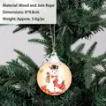 Vintage wooden Christmas tree ornament with snowman design hanging on pine tree branch - Snowman with Top Hat Style