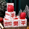 Festliche weiße Weihnachts-Apfel-Geschenkboxen mit 'Merry Christmas' und 'Frieden' Design - Weihnachtsmann-Süßigkeitenbox (Leere Box) / 10x10cm