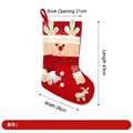 Large red Christmas stocking gift bag featuring festive elk design and glittery accents - Red Gold-Stamped Christmas Stocking - Reindeer