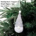 Grey and white knitted Christmas gnome ornament with pom-pom details hanging on tree - Knitted Ornament Style E (Light Grey)