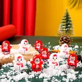 Mini-Weihnachtsmann- und Schneemann-Stehaufmännchen als Partygeschenk. - Gemischte Weihnachts-Stehaufmännchen