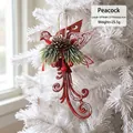 Decorative red peacock Christmas tree ornament with pine cone and needle accents - Peacock