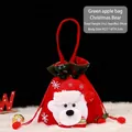 Festive red Christmas plush gift bag featuring a cute white bear design for treats - Green Trim Bear Drawstring Bag