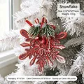 Red vintage snowflake Christmas tree hanging ornament with festive pine needle detail - Snowflake