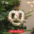 Christmas pretzel ornament with gold plating and colorful sprinkles for tree decor. - Gold Heart Pretzel Style