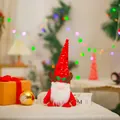Festive Christmas gnome plush toy featuring a red sequined hat and brown antlers decor - Sequin Antler Hat / Red