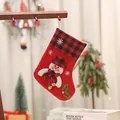 Red Christmas stocking featuring a snowman design and buffalo plaid cuff for tree decor - Red and Black Plaid Stocking with Bell (Snowman)