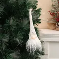 Decorative glowing Christmas gnome ornament featuring a white beard and a sequined pointed hat - Glowing Style / Off White