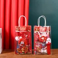 Detail view of Christmas stationery gift sets in festive packaging with Santa and reindeer. - Christmas Handheld Gift Bag / 1 Pack