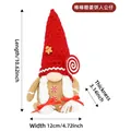 Christmas gingerbread gnome plush toy with red knitted hat and white braids - Female With Lollipop