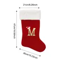Large red velvet Christmas stocking featuring a golden letter M and detailed size measurements - Style M / L