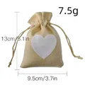 Piccolo sacchetto in juta con cuore bianco e indicazioni di taglia - Kaki
