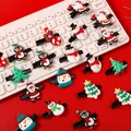 Lindas pinzas de pelo navideñas con diseños de Papá Noel y muñeco de nieve en teclado - Estilo Navideño Aleatorio