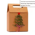 Large Christmas kraft paper gift bag featuring a fir tree decoration and red bow accent - Christmas Tree / L
