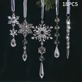 Macro view of 18 clear acrylic Christmas ornaments including snowflakes and icicles - Set of 18 / Clear
