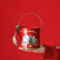 Red Christmas tinplate gift box featuring festive illustrations and a metal handle - Round with Decoration / Red