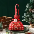 Red checkered Christmas drawstring gift bag featuring a plush Santa Claus decoration - Santa Claus Plush Doll Drawstring Bag / 11x15cm
