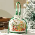 Festive Christmas drawstring gift bag featuring Santa Claus and winter scene prints - Christmas Paradise / L / White and Green