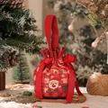 Festliche rote Weihnachts-Geschenktüte aus Segeltuch mit Weihnachtsmann-Druck und Bändern - Weihnachten Leinen Rundbeutel / Roter Karo-Weihnachtsmann