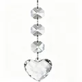 Close-up view of faceted transparent octagonal beads and heart pendant decoration - Heart Pendant