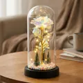 Glowing iridescent galaxy rose in glass dome with mini Christmas trees and LED lights - Plastic Dome + Color Box / Galaxy Gold with Warm Light and Black Base