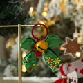 Portachiavi natalizio festivo con fiocco verde glitterato e campanellino giallo - Spilla ciondolo natalizio - stile 1