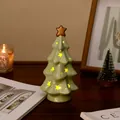 Small green ceramic Christmas tree night light with glowing stars and golden star topper - Star Christmas Tree / Light-up