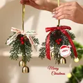 Festive Christmas tree hanging ornaments with pine cones, red berries, and gold bells. - Pine & Cedar Santa Double Bell Ornament Set