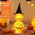 Two-tier Halloween pumpkin paper lantern stand with black witch hat for festive decor - Standing Halloween Lantern Ornaments with Copper Wire Lights (String of 2)
