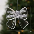 Elegante fiocco di Natale trasparente per albero con glitter argento, 9x9cm, 36g. - Ornamento a fiocco / Pezzo Singolo / Trasparente