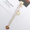 Golden double-layer phone case strap with pearls heart charms and coin pendant - K2401 / Double Layer Artificial Pearl Chain With Pendant (Heart Clasp)