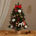 Miniature tabletop Christmas tree with rustic DIY ornaments on a woven mat base - Red Pony 60cm
