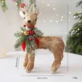Christmas straw-woven deer ornament with pine and red bow detail, 33cm height SKU view. - Deer