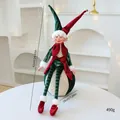 Festliche Weihnachts-Elfenpuppe in Rot und Grün auf Ornament sitzend, 62 cm hoch - 62*18*18cm / Roter und grüner Elf