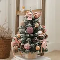 Mini snow-flocked Christmas tree tabletop ornament with pink bows and lights, 45cm height - 45cm / Pink House Style