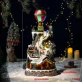 Large LED Christmas snow village ornament with rotating hot air balloon - Santa Claus Hot Air Balloon Music Box