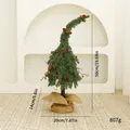 Small green curved tabletop Christmas tree with pinecones and rustic burlap base - 50cm / Bent Green With Decoration